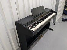Load image into Gallery viewer, Roland RP301 digital piano in satin black finish stock number 24489