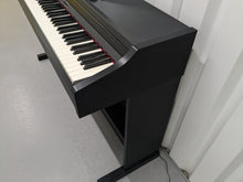 Load image into Gallery viewer, Roland RP301 digital piano in satin black finish stock number 24489