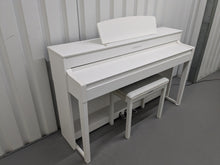 Load image into Gallery viewer, Yamaha Clavinova CLP-545 digital piano in satin white with stool. stock nr 24494