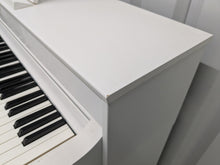 Load image into Gallery viewer, Yamaha Clavinova CLP-545 digital piano in satin white with stool. stock nr 24494