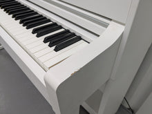 Load image into Gallery viewer, Yamaha Clavinova CLP-545 digital piano in satin white with stool. stock nr 24494