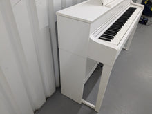 Load image into Gallery viewer, Yamaha Clavinova CLP-545 digital piano in satin white with stool. stock nr 24494