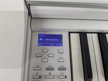 Load image into Gallery viewer, Yamaha Clavinova CLP-545 digital piano in satin white with stool. stock nr 24494