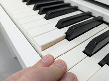 Load image into Gallery viewer, Yamaha Clavinova CLP-545 digital piano in satin white with stool. stock nr 24494