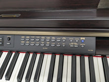 Load image into Gallery viewer, YAMAHA CLAVINOVA CLP-270 DIGITAL PIANO AND STOOL IN DARK ROSEWOOD stock nr 24510