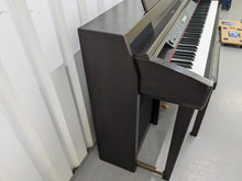 Load image into Gallery viewer, YAMAHA CLAVINOVA CLP-270 DIGITAL PIANO AND STOOL IN DARK ROSEWOOD stock nr 24510