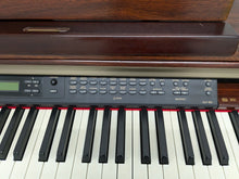 Load image into Gallery viewer, Yamaha Clavinova CLP-150 digital piano and stool in mahogany stock #24519