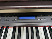 Load image into Gallery viewer, Yamaha Clavinova CLP-970 Digital Piano and stool in rosewood stock #24524