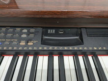 Load image into Gallery viewer, Yamaha Clavinova CVP-103 digital piano arranger in mahogany stock #24516