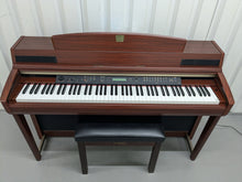Load image into Gallery viewer, YAMAHA CLAVINOVA CLP-270 DIGITAL PIANO AND STOOL IN MAHOGANY FINISH stock #24538