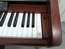 Load image into Gallery viewer, YAMAHA CLAVINOVA CLP-270 DIGITAL PIANO AND STOOL IN MAHOGANY FINISH stock #24538