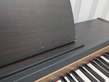 Load image into Gallery viewer, Roland HP101e Digital Piano and stool in dark rosewood finish stock # 24557