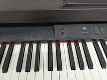 Load image into Gallery viewer, Yamaha Clavinova CLP-820 Digital Piano in dark rosewood stock nr 24585