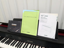 Load image into Gallery viewer, CASIO CELVIANO AP-450 DIGITAL PIANO AND STOOL IN SATIN BLACK stock no 24596