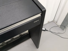 Load image into Gallery viewer, Roland F110 compact slim size Digital Piano in black stock # 24580