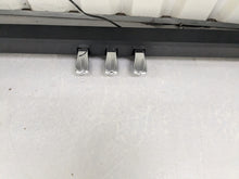 Load image into Gallery viewer, Roland F110 compact slim size Digital Piano in black stock # 24580