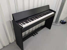 Load image into Gallery viewer, Roland F110 compact slim size Digital Piano in black stock # 24580