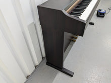 Load image into Gallery viewer, Roland HP101e Digital Piano in dark rosewood finish stock # 24589