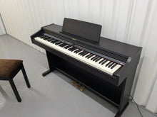 Load image into Gallery viewer, Roland RP301 digital piano in dark rosewood finish stock number 24608