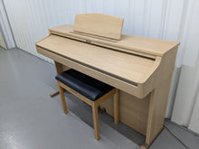 Load image into Gallery viewer, Roland HP102e digital piano and stool in light oak finish stock number 24617