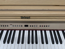 Load image into Gallery viewer, Roland HP102e digital piano and stool in light oak finish stock number 24617