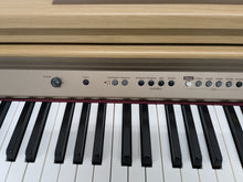 Load image into Gallery viewer, Roland HP102e digital piano and stool in light oak finish stock number 24614