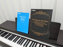 Load image into Gallery viewer, Yamaha Arius YDP-142 Digital Piano and stool in dark rosewood stock #24631