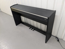 Load image into Gallery viewer, Roland F110 compact slim size Digital Piano in black stock # 24652