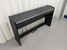 Load image into Gallery viewer, Roland F110 compact slim size Digital Piano in black stock # 24652