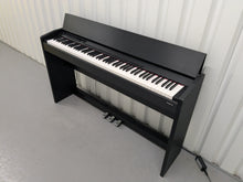 Load image into Gallery viewer, Roland F110 compact slim size Digital Piano in black stock # 24652