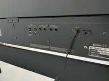 Load image into Gallery viewer, Roland F110 compact slim size Digital Piano in black stock # 24652