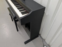 Load image into Gallery viewer, Roland RP102 digital piano and stool in satin black finish stock number 25008