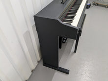 Load image into Gallery viewer, Roland RP102 digital piano and stool in satin black finish stock number 25008
