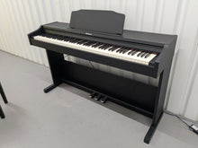 Load image into Gallery viewer, Roland RP102 digital piano and stool in satin black finish stock number 25008