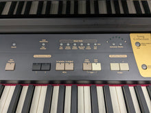 Load image into Gallery viewer, Roland KR-5 Intelligent Digital Piano and stool, 88 weighted keys stock # 25023