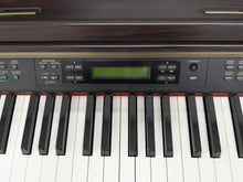 Load image into Gallery viewer, YAMAHA CLAVINOVA CLP-270 DIGITAL PIANO AND STOOL IN DARK ROSEWOOD stock nr 25012