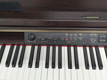 Load image into Gallery viewer, YAMAHA CLAVINOVA CLP-270 DIGITAL PIANO AND STOOL IN DARK ROSEWOOD stock nr 25012