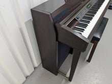 Load image into Gallery viewer, YAMAHA CLAVINOVA CLP-270 DIGITAL PIANO AND STOOL IN DARK ROSEWOOD stock nr 25012