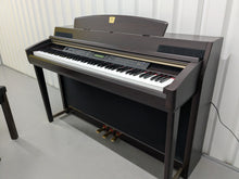 Load image into Gallery viewer, YAMAHA CLAVINOVA CLP-270 DIGITAL PIANO AND STOOL IN DARK ROSEWOOD stock nr 25012
