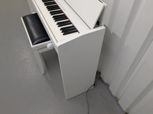 Load image into Gallery viewer, Roland F130R Digital Piano in white with matching colour stool stock # 25027