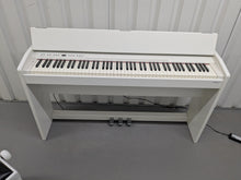 Load image into Gallery viewer, Roland F130R Digital Piano in white with matching colour stool stock # 25027