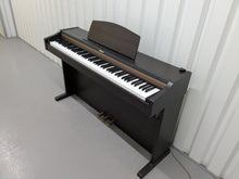 Load image into Gallery viewer, Roland HP101e Digital Piano in dark rosewood finish stock # 25037