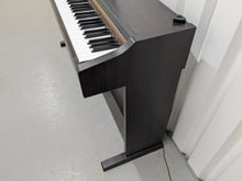 Load image into Gallery viewer, Roland HP101e Digital Piano in dark rosewood finish stock # 25037