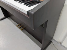 Load image into Gallery viewer, Roland HP101e Digital Piano in dark rosewood finish stock # 25037