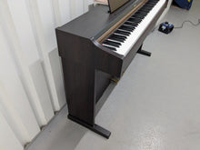 Load image into Gallery viewer, Roland HP101e Digital Piano in dark rosewood finish stock # 25037