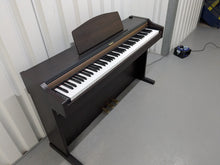 Load image into Gallery viewer, Roland HP101e Digital Piano in dark rosewood finish stock # 25037