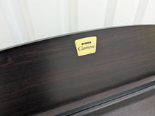 Load image into Gallery viewer, Yamaha Clavinova CLP-220 digital piano in dark rosewood stock #25024