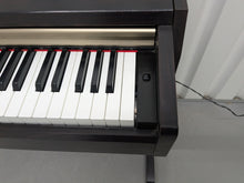 Load image into Gallery viewer, Yamaha Clavinova CLP-220 digital piano in dark rosewood stock #25024