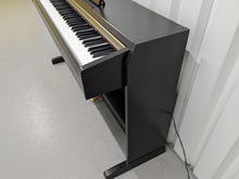 Load image into Gallery viewer, Yamaha Clavinova CLP-220 digital piano in dark rosewood stock #25024