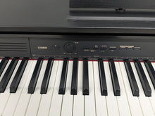 Load image into Gallery viewer, Casio Celviano AP-250 digital piano and stool in satin black finish stock number 25062